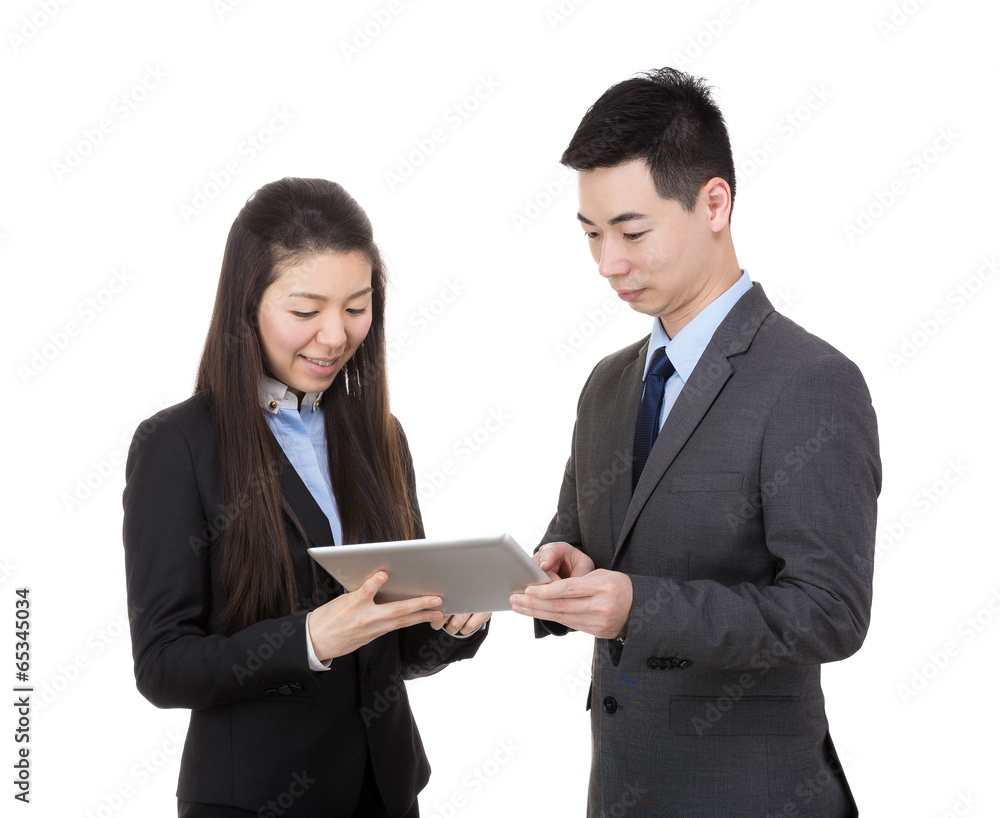 Businesspeople using tablet together Businesspeople using tablet together