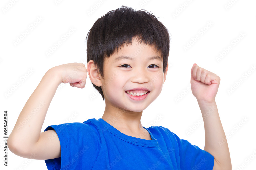 Little boy showing hand biceps muscles Little boy showing hand biceps muscles