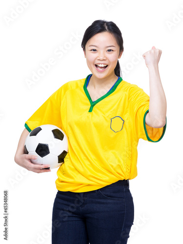 Happy female soccer supporter © leungchopan