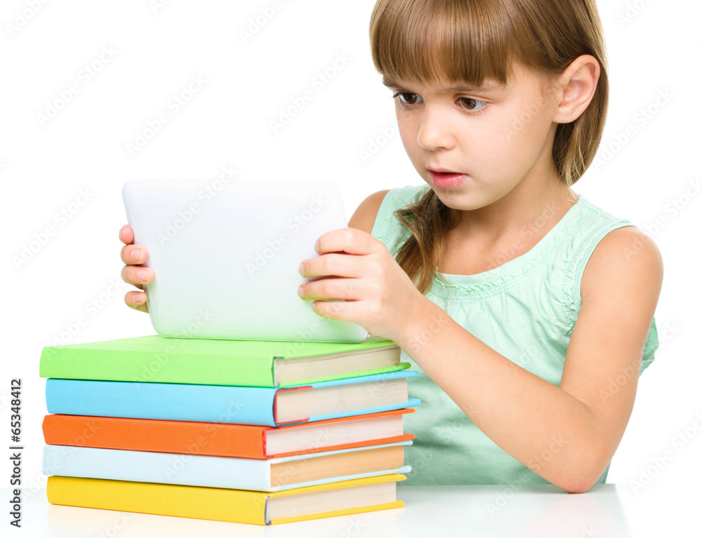 Young girl is using tablet Young girl is using tablet