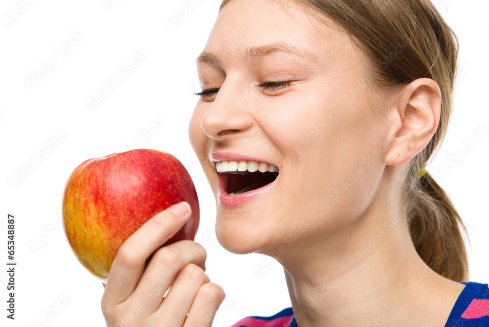 Young happy girl with apple Young happy girl with apple