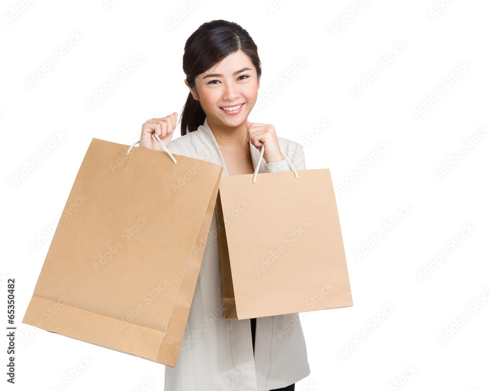Happy woman holding shopping bag Happy woman holding shopping bag