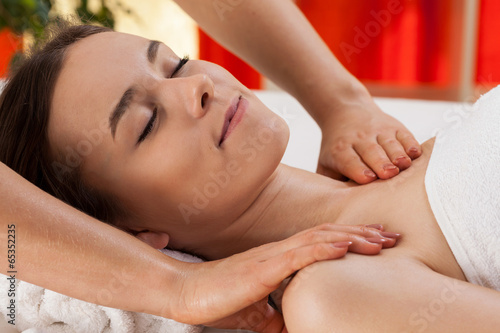 Woman during shoulder massage