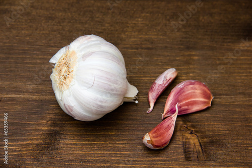 Garlic on wood top photo