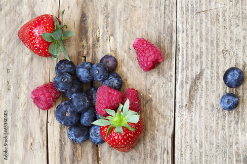 Fototapeta Naklejka Na Ścianę i Meble -  summer fruits and berries, strawberries, blueberries, raspberrie