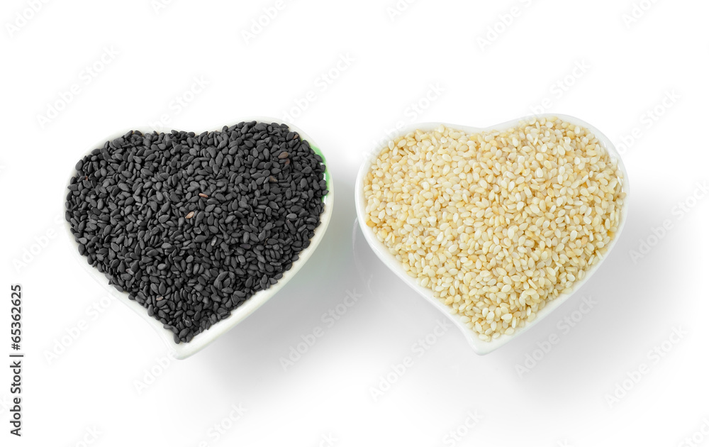 sesame in Heart Shaped Cup isolated on white background sesame in Heart Shaped Cup isolated on white background