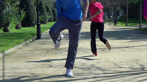 Jogger having muscle contraction, slow motion shot at 240fps, st photo