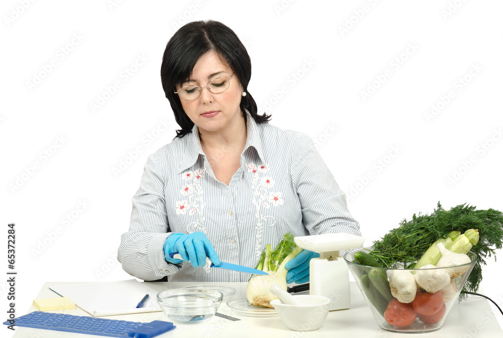 Phytocontrol technician intending to cut a fennel Phytocontrol technician intending to cut a fennel