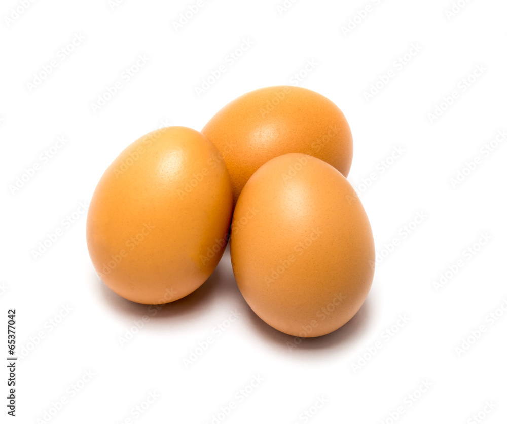 Fresh brown eggs on white background. Fresh brown eggs on white background.