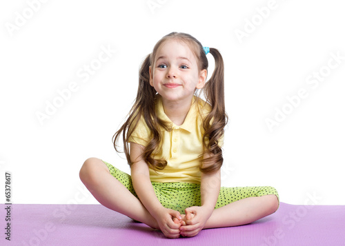 Child girl doing fitness ex...