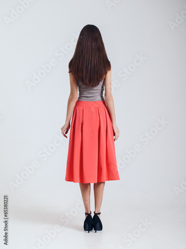 Quadro em tela Girl in beautiful skirt. Catalogue shoot. Isolated on white back