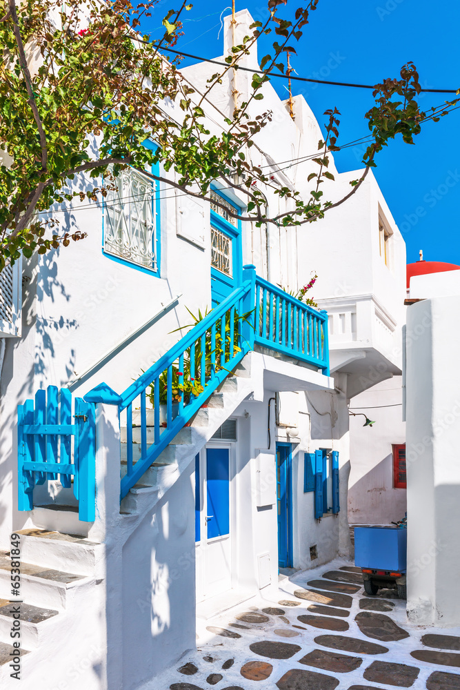 White house with typically colourful balustrade in Mykonos