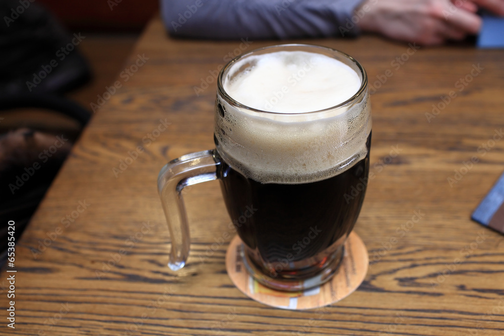 Mug of dark beer Mug of dark beer
