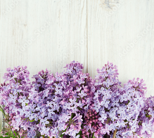 beautiful lilac on white wooden surface