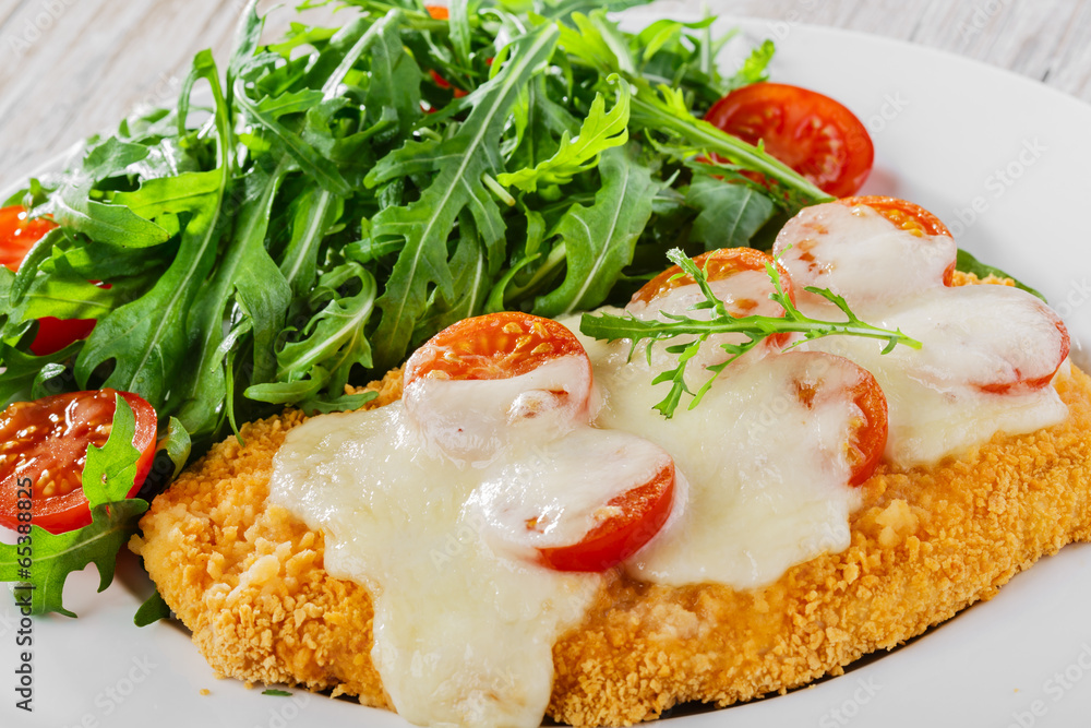 Baked chicken with mozzarella and cherry tomatoes fillet Baked chicken with mozzarella and cherry tomatoes fillet