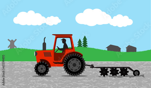tractor processes the earth a rural landscape