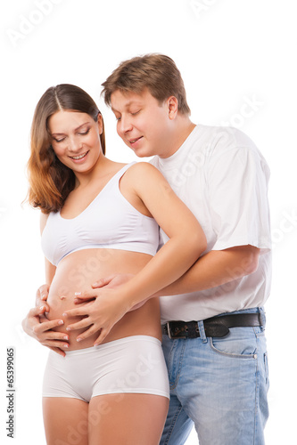 Young couple pregnant mother and happy father