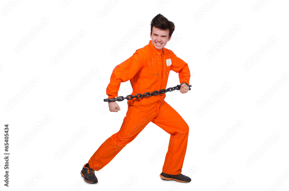 Young inmate with chains isolated on the white Young inmate with chains isolated on the white