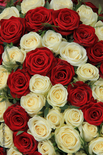 Red and white roses in a wedding arrangement