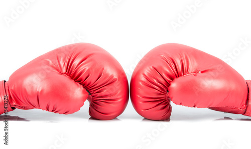 Pair of red leather boxing gloves isolated