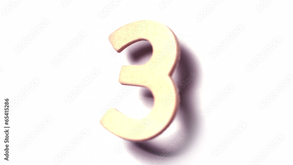 The number 3 rising on white background The number 3 rising on white background