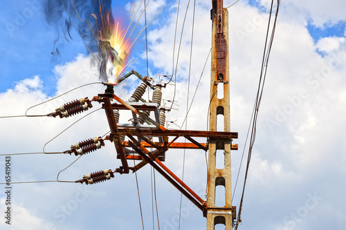 Obraz na plátně Overloaded electrical circuit causing electrical short