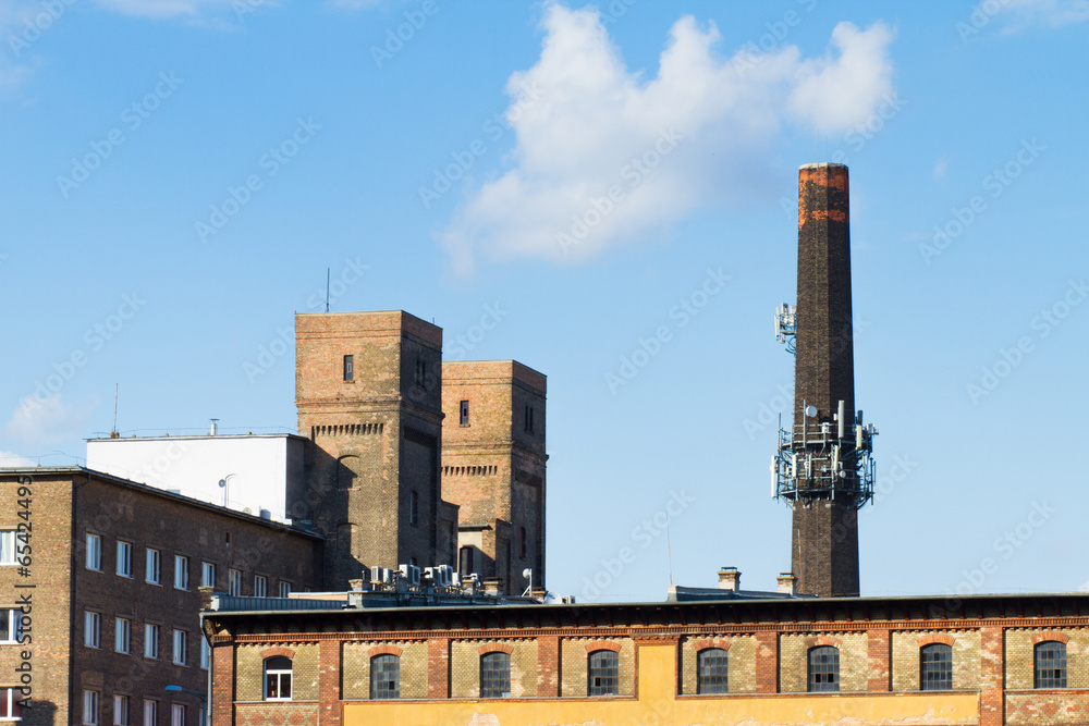 old brick chimney of an old factory