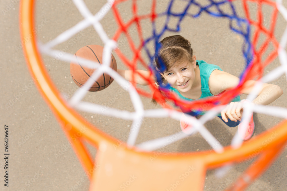View through the net of a basketball shooter
