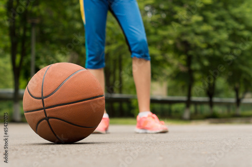 Basketball on an outdoor asphalt court