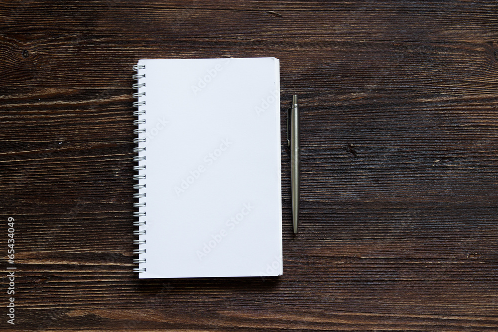 Notbook and pen Notbook and pen