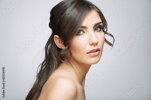 Beautiful girl with fresh make up, long hair style.