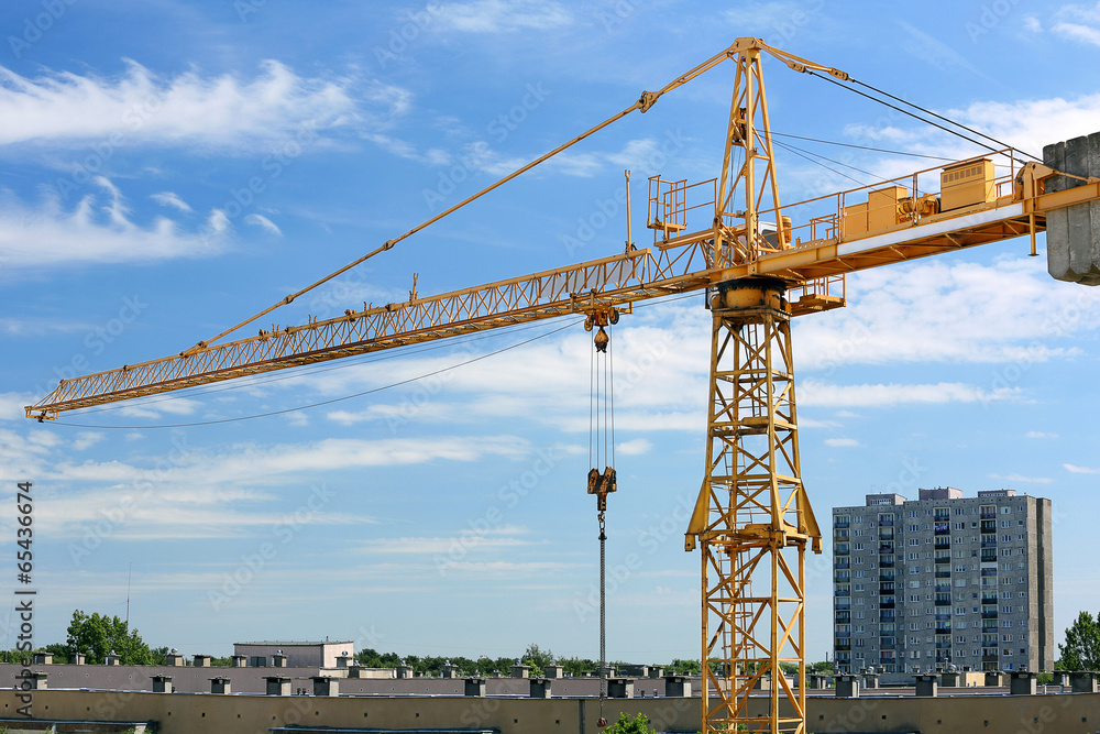 Industrial construction crane and buildings