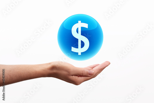 Dollar Symbol in Blue sphere on hand photo