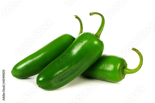 Group of jalapeno peppers isolated on white