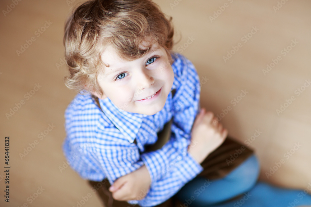Portrait of adorable little boy with blond hairs and blue eyes Portrait of adorable little boy with blond hairs and blue eyes