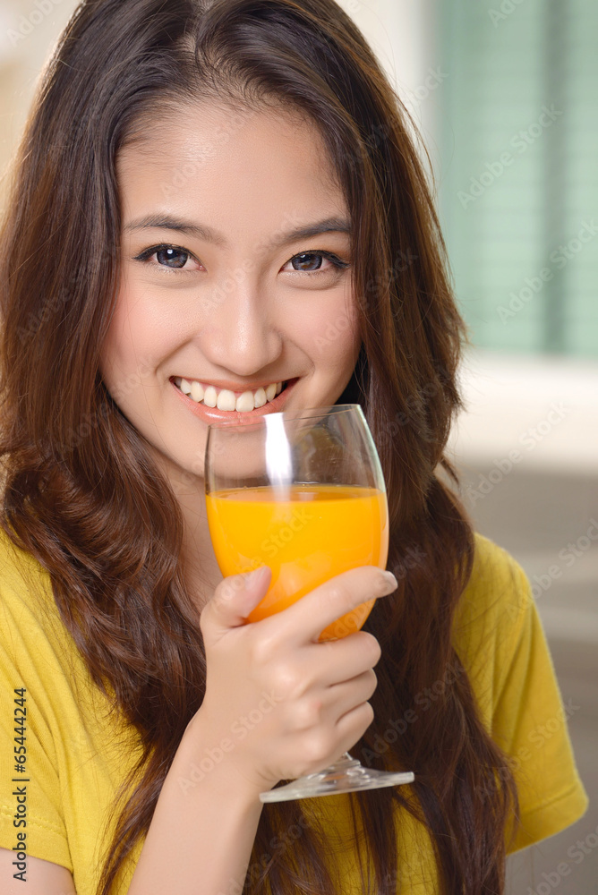 Asian young women cute woman drinking orange juice Asian young women cute woman drinking orange juice