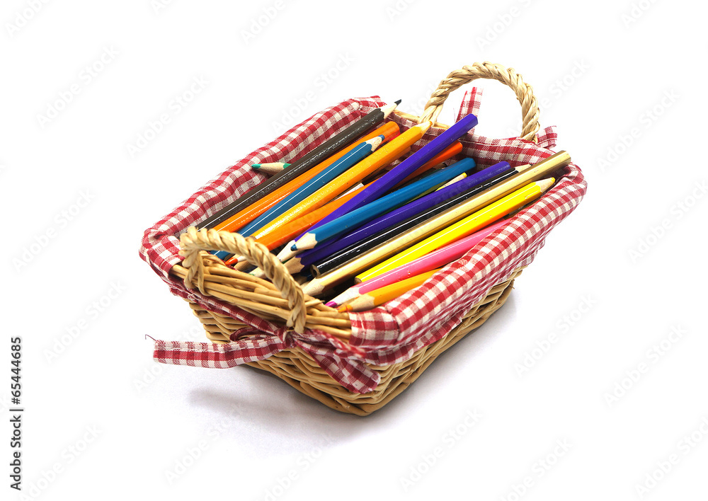 Color pencils in  basket isolate