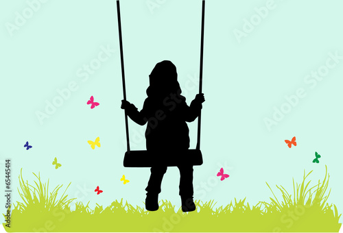 Little girl on a swing.