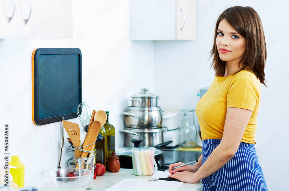Beautiful woman in kitchen. Beautiful woman in kitchen.