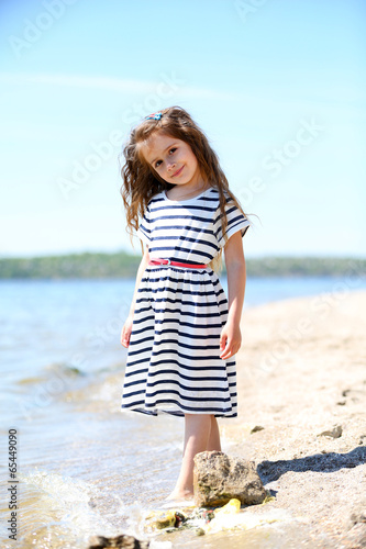 Beautiful little girl on th...