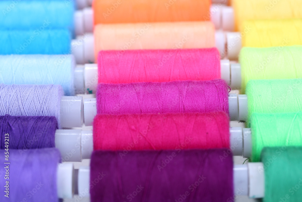 Multicolor sewing threads background Multicolor sewing threads background