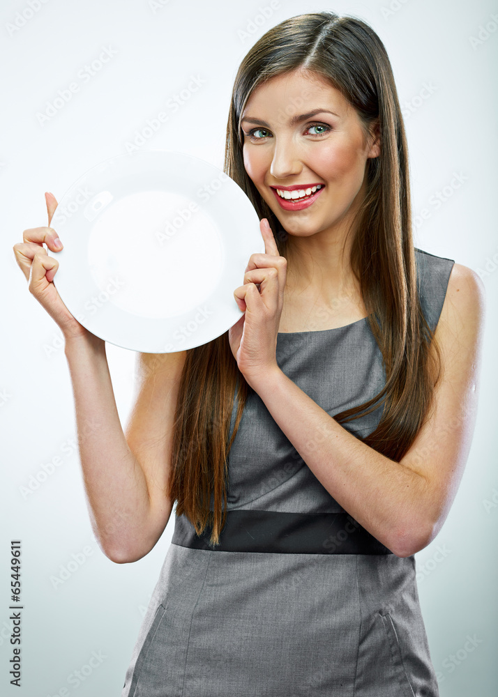 portrait of business woman hold empty white plate. portrait of business woman hold empty white plate.