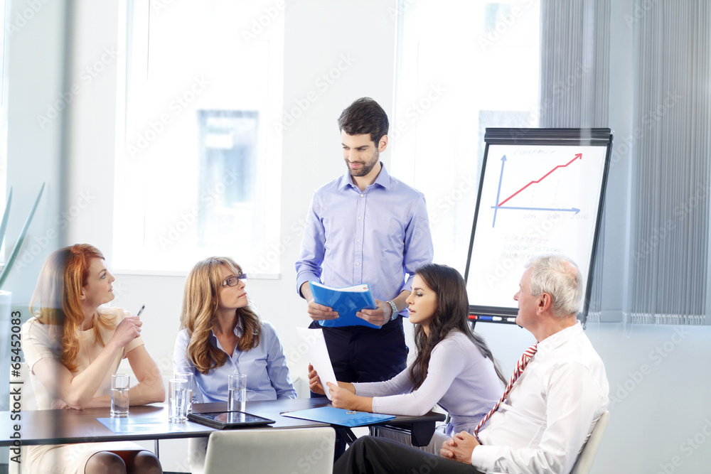 Business people discussing in a meeting Business people discussing in a meeting