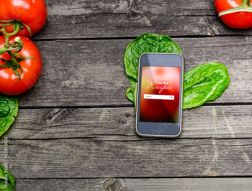 Obraz na płótnie Cooking recipes on smart phone w salonie