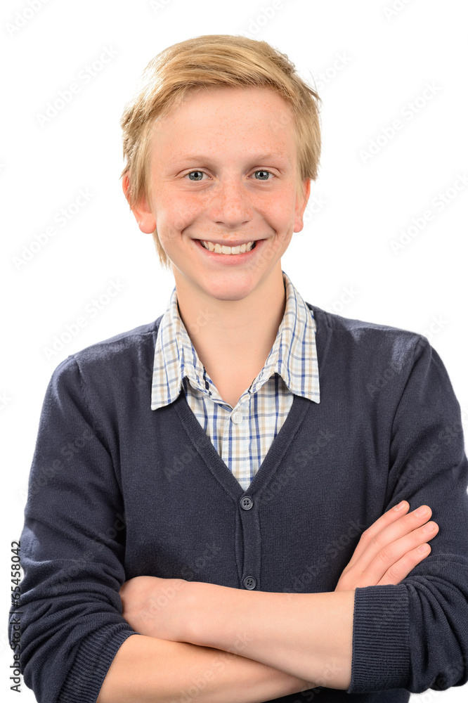 Cheerful teenage boy standing arms crossed Cheerful teenage boy standing arms crossed