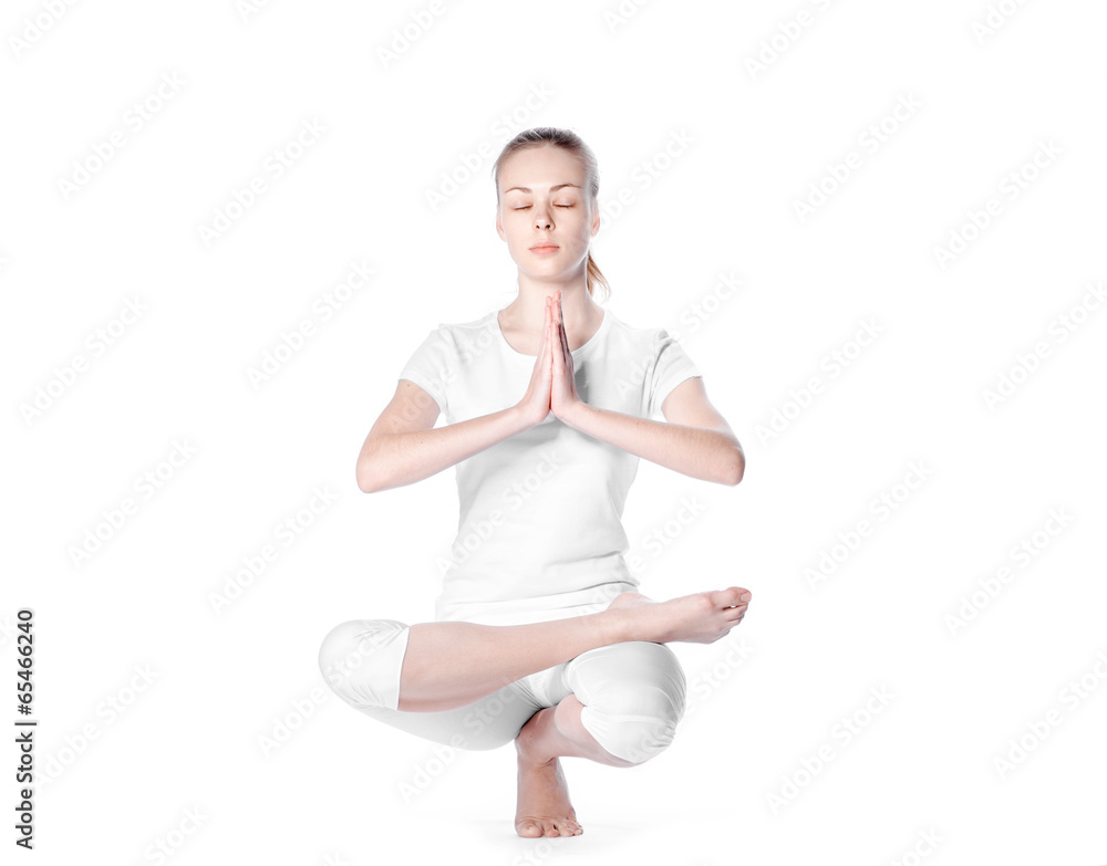 young beautiful woman doing yoga on white background young beautiful woman doing yoga on white background