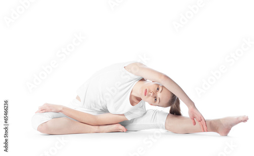 young beautiful woman doing exercise on white background