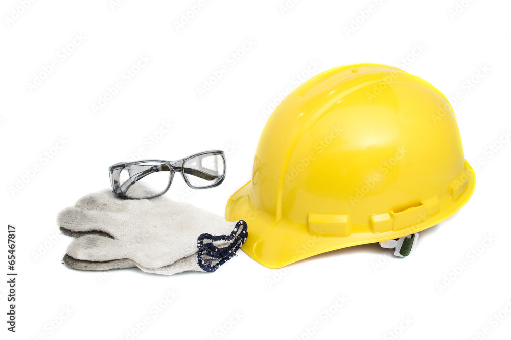 Safety helmet, glasses, and gloves on white with clipping path Safety helmet, glasses, and gloves on white with clipping path