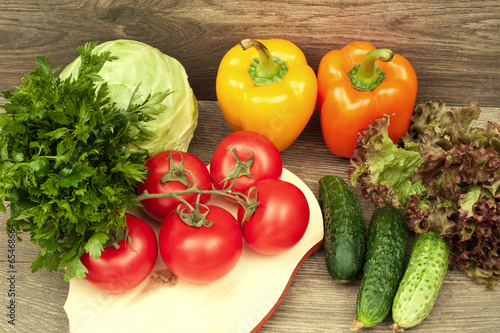 vegetables on a wooden background, top view