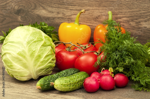 set of vegetables on a wooden background